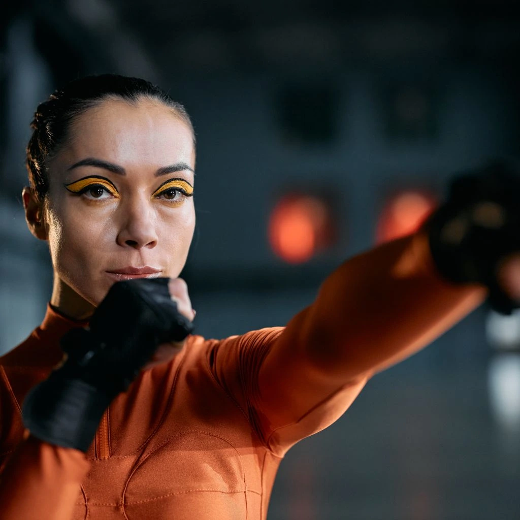 Reign-sponsored MMA strawweight fighter wearing Reign fight kit