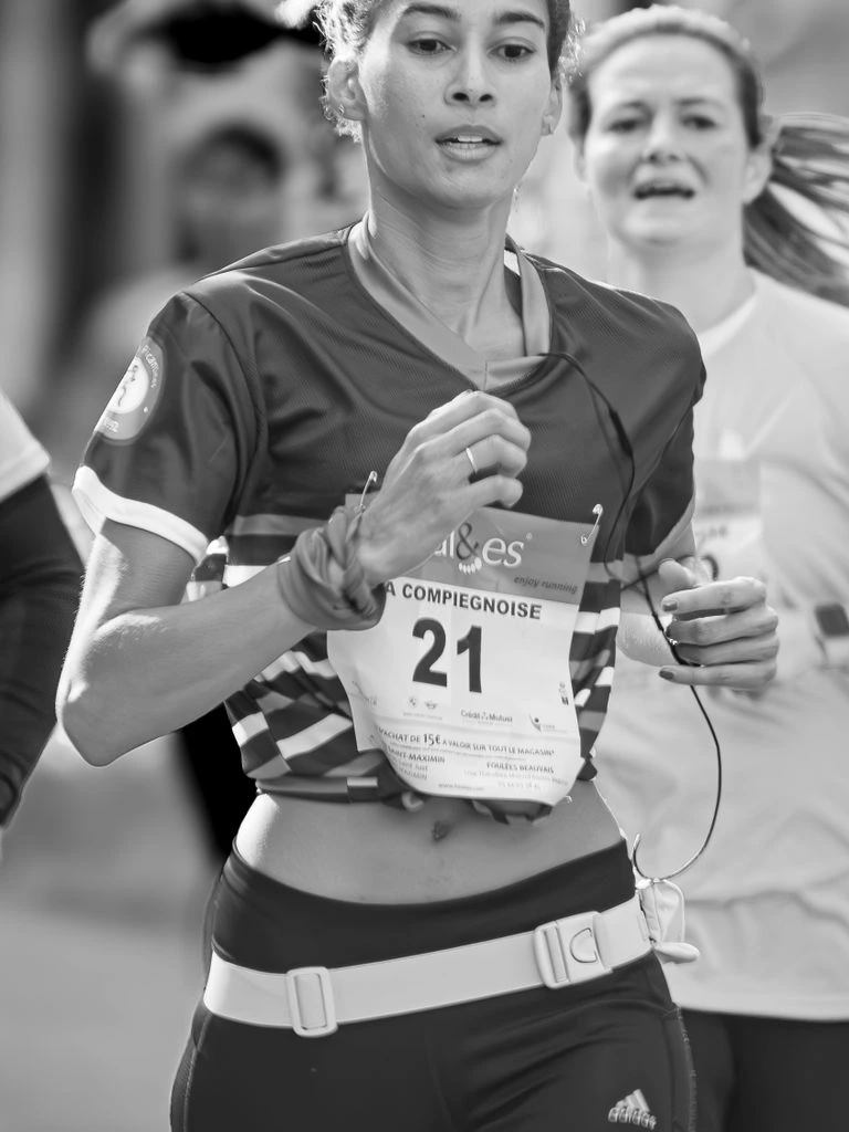 Priya Subramanian — 2:31 marathoner, photographed on her dawn long-run route.